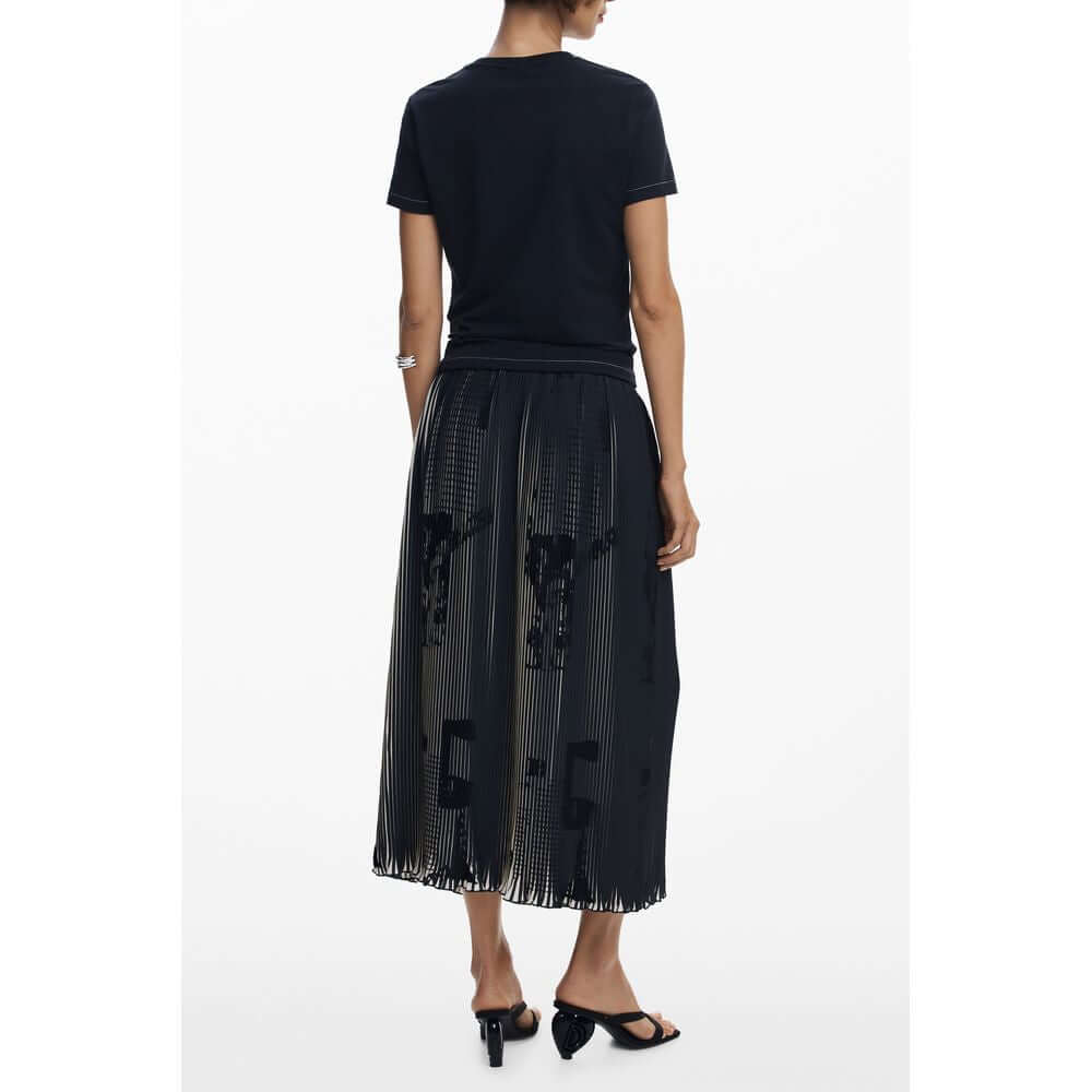 Back view of Desigual Black Polyester Women Skirt with newspaper motifs and pleated design, showcasing chic style.