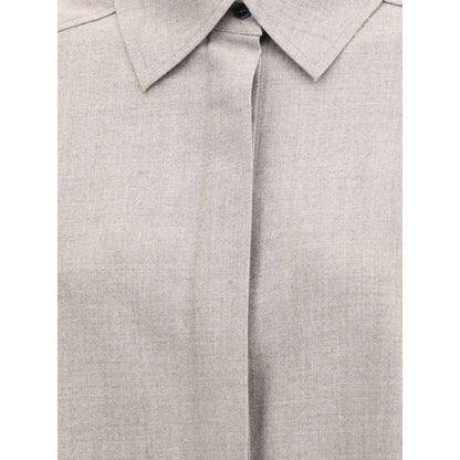 Close-up of Di Stavnitser Gray Fleece Wool Dress Shirt, featuring a classic collar and front button closure with stylish details.