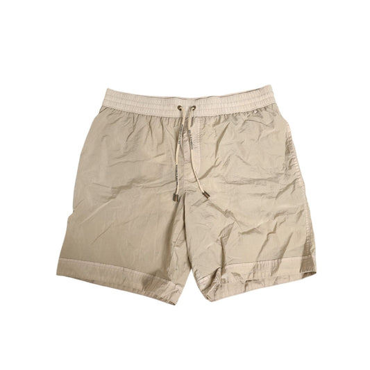 Dolce & Gabbana Beige Nylon Beachwear Men Boxer Short Swimwear with logo drawstring and side pockets, ideal for luxurious beach style.