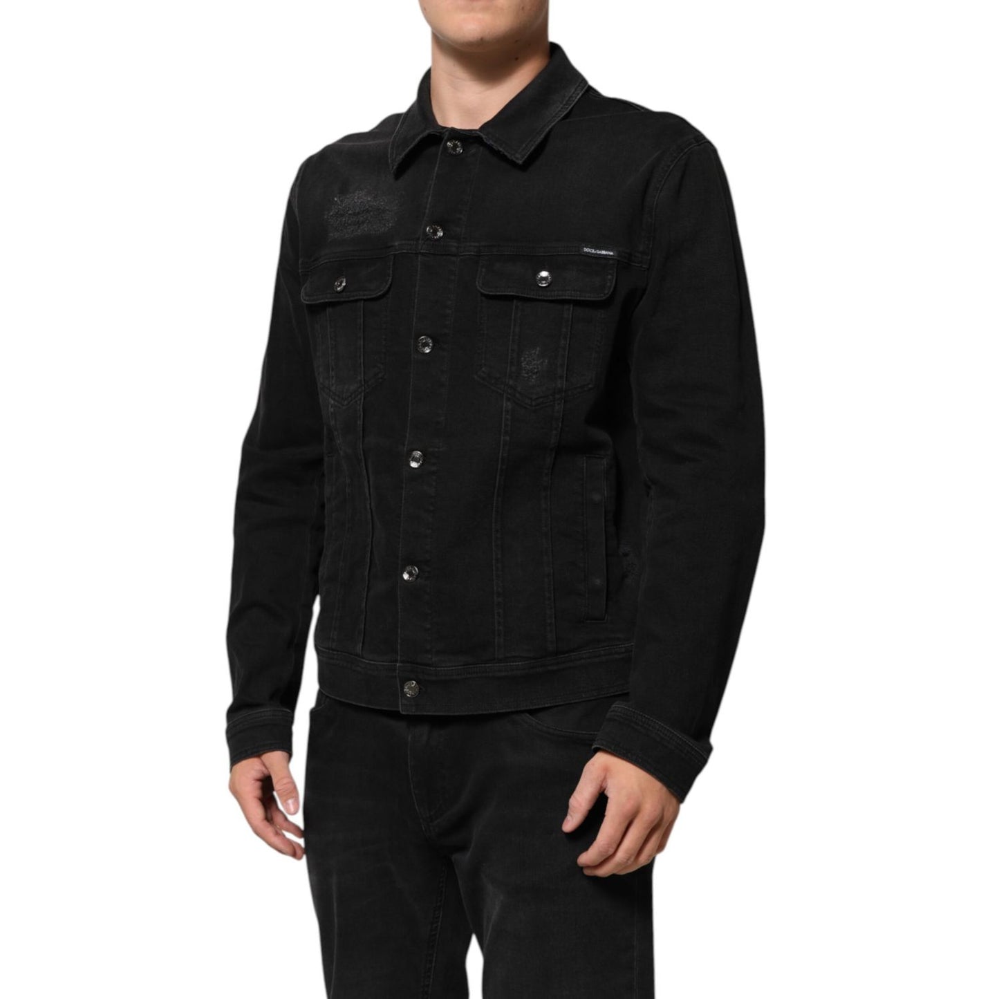 Dolce & Gabbana Black Cotton Denim Stretch Button Up Jacket with flap pockets, black color, made in Italy, worn by a model.