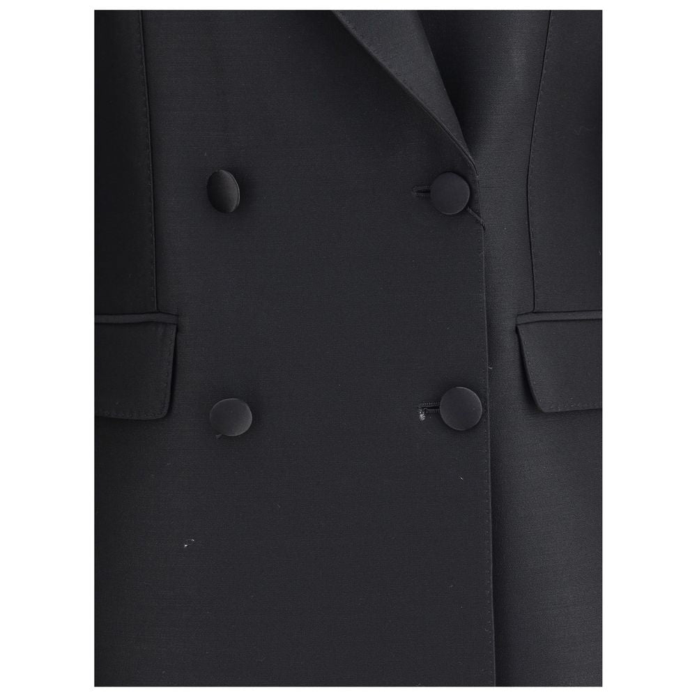 Dolce & Gabbana Black Fleece Wool Blazer with four-button closure and peaked lapels, showcasing classic sartorial elegance.