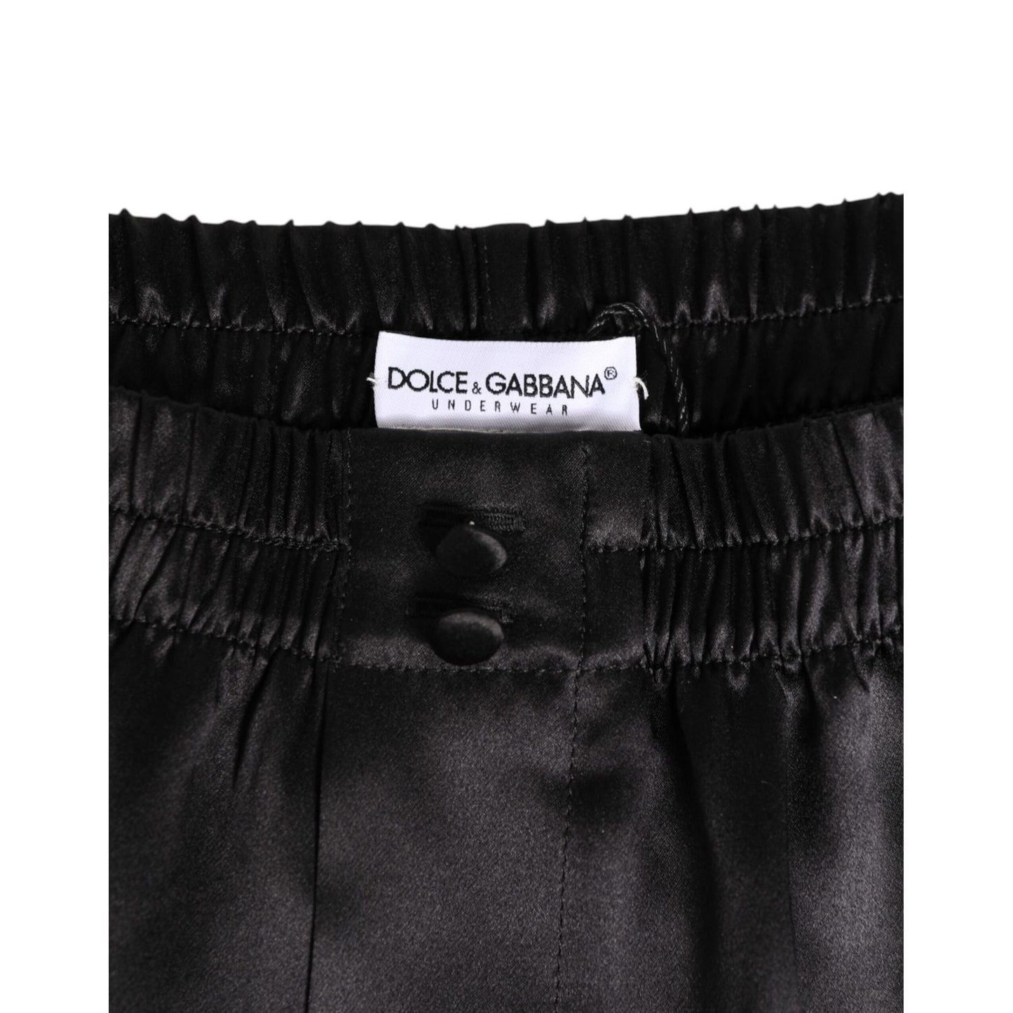 Dolce & Gabbana Black Silk Satin Elastic Men Boxer Short Swimwear with logo and button detail.