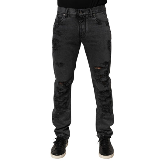 Dolce & Gabbana Black Tattered Skinny Cotton Men Denim Jeans with distressed detailing and classic five-pocket design.