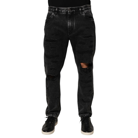 Dolce & Gabbana Black Washed Ripped Loose Cotton Denim Jeans with a relaxed fit and distressed details, perfect for casual streetwear outfits.