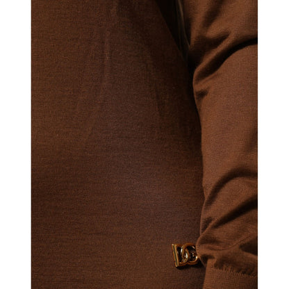 Close-up of Dolce & Gabbana Brown Cashmere Turtle Neck Pullover Sweater fabric and logo detail.