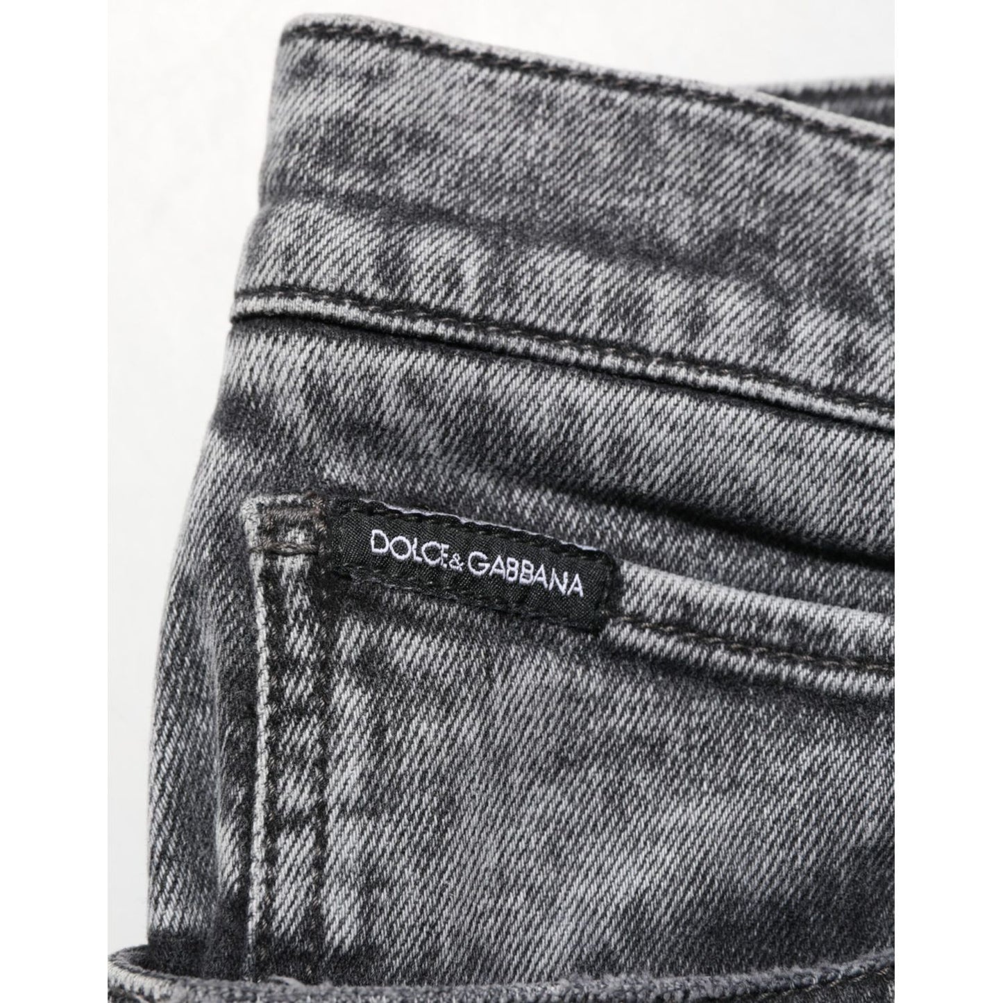 Close-up of Dolce & Gabbana Gray Cotton Slim Fit Denim Trouser Jeans with logo detail on pocket.