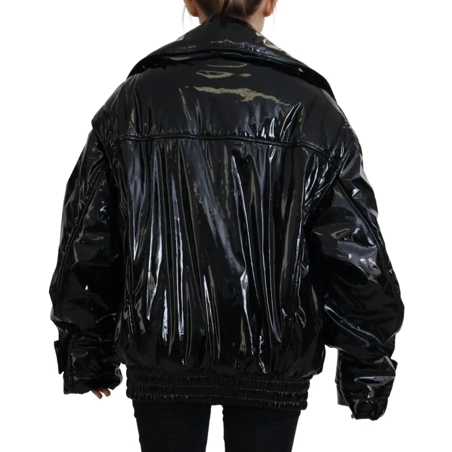 Back view of Dolce & Gabbana Polyester Black Shiny Blazer Women Jacket with long sleeves and replaced button detail.