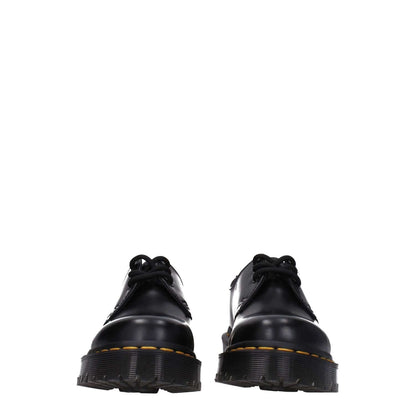 Front view of Dr. Martens Black Leather Oxfords And Derbies, casual lace-up shoes with mid heels and rubber sole.
