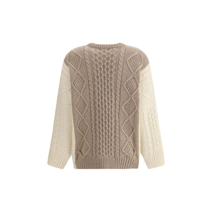 Ella Cream Cashmere Cashmere Sweater with two-tone cable-knit design, ribbed crewneck, hem, and cuffs, elegant winter fashion.