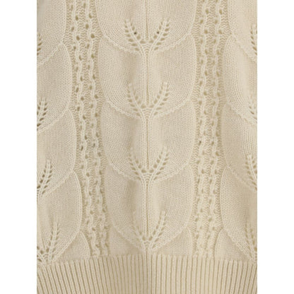 Close-up of Ermanno Scervino Cream Cashmere Sweatshirt showcasing perforated design and ribbed hem.