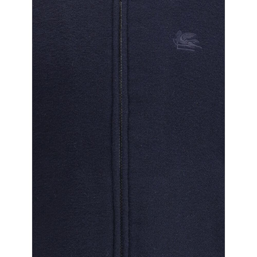 Etro Blue Wool Bomber with embroidered Pegasus logo and ribbed collar, featuring a front zipper closure and side welt pockets for style and elegance.