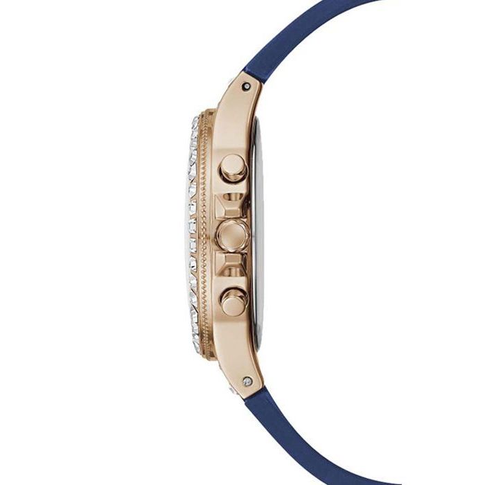 Side view of GUESS Mod. GW0257L3 watch with blue strap and rose gold-tone case featuring quartz movement and mineral dial, 3 ATM water resistant.