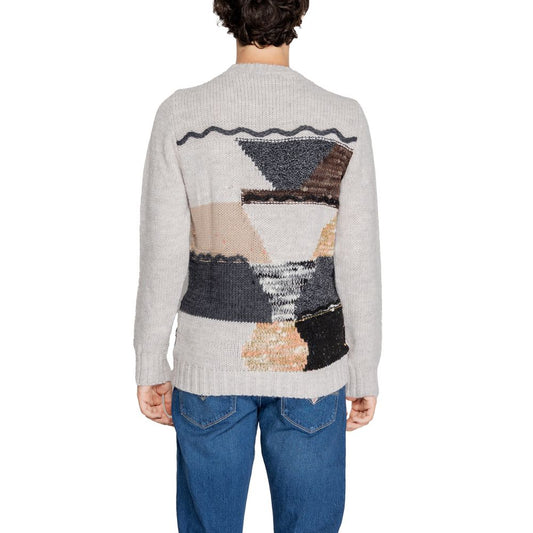 Back view of model wearing Gianni Lupo Beige Marabou Sweater showcasing abstract design, men's knitwear for fall/winter.