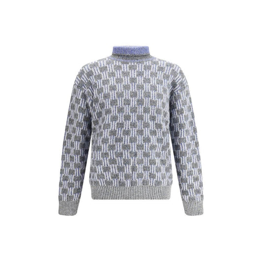Giorgio Armani Light Blue Cotton Turtleneck with graphic two-tone pattern, crafted from alpaca wool and cashmere blend for warmth.