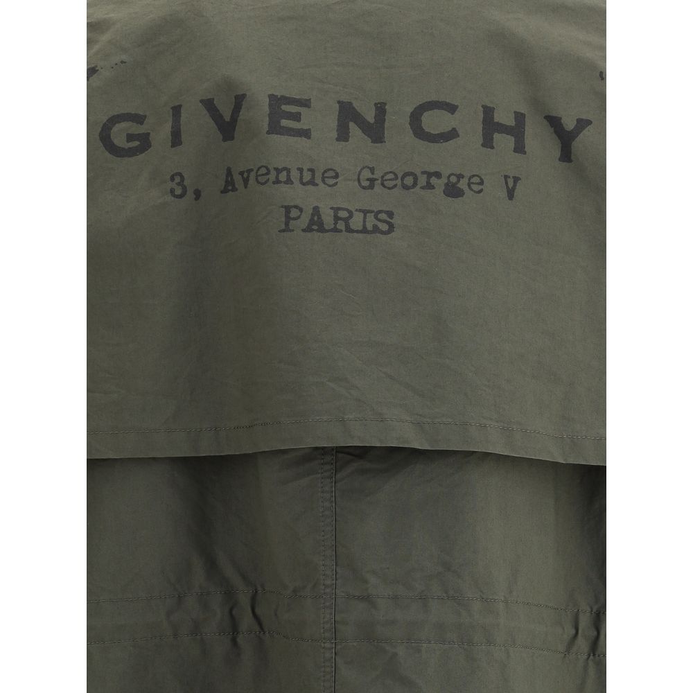 Back view of Givenchy Bicolor Cotton Clothing showing iconic monogram and address detail on an oversized parka jacket.