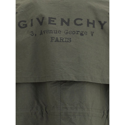 Back view of Givenchy Bicolor Cotton Clothing showing iconic monogram and address detail on an oversized parka jacket.