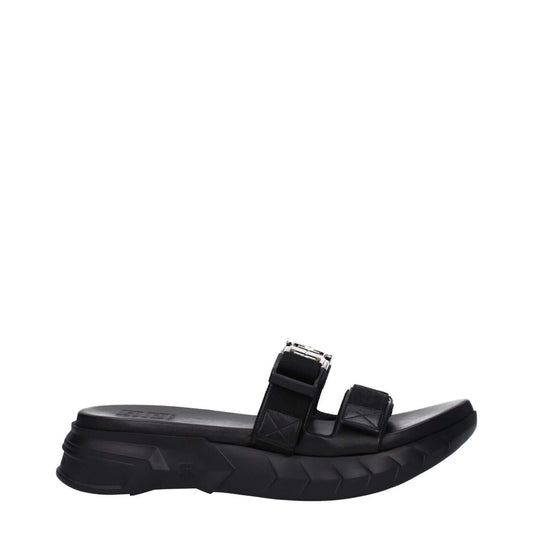 Givenchy Black Fabric Slippers with silver logo, open toe, mid heels, and rubber sole, featuring clips closure. MPN: BH301QH1A2001.