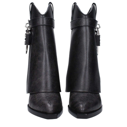 Givenchy Black Leather Ankle Boots with vintage effect, aged look, silver side detail, and wedge heel; MPN BE6048E1WZ001.