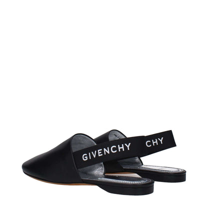 Givenchy Black Leather Mules with side and back logos, featuring round toe and low flat heel, casual style sandal.