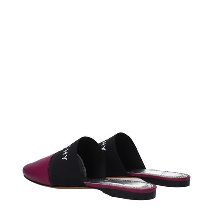 Givenchy Purple Leather Slippers with front logo, round toe, low flat heel, dark orchid accents. Style: Casual, Material: Leather.