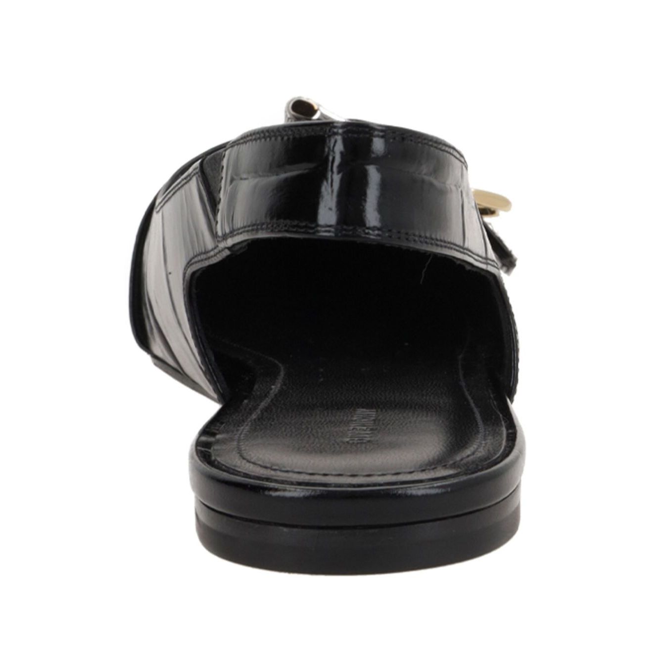 Rear view of Givenchy Voyou Ballerinas in black crocodile embossed leather with decorative buckle and elastic slingback strap.