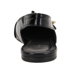 Rear view of Givenchy Voyou Ballerinas in black crocodile embossed leather with decorative buckle and elastic slingback strap.