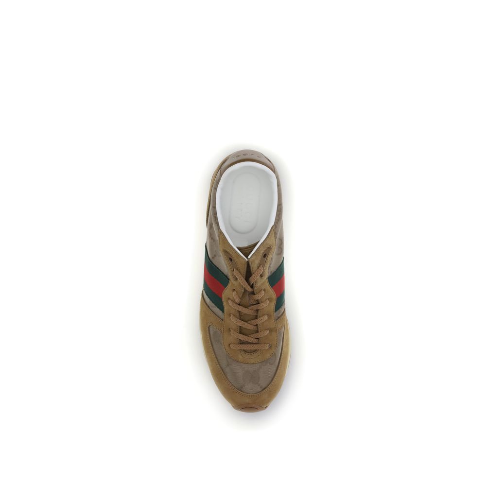 Top view of Gucci Beige Polyamide Athletic Sneakers with green and red Web stripe, featuring GG canvas and suede trim details.