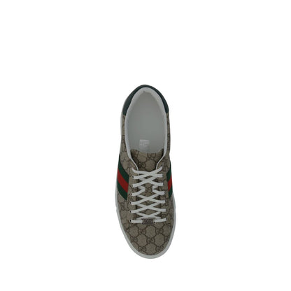 Top view of Gucci Beige Rubber Low Top Sneakers with lace-up closure, iconic GG jacquard, and leather back logo detail.