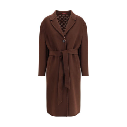 Gucci Brown Wool Coat with notch lapels, button closure, side pockets, and reversible GG pattern in silk wool.