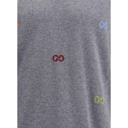 Gucci Gray Cashmere Sweatshirt with multicolor jacquard logo pattern, featuring soft wool with ribbed crew neck, cuffs, and hem.