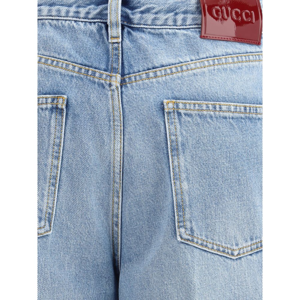 Back view of Gucci Light Blue Cotton Jeans Denim with contrast stitching and leather logo patch.