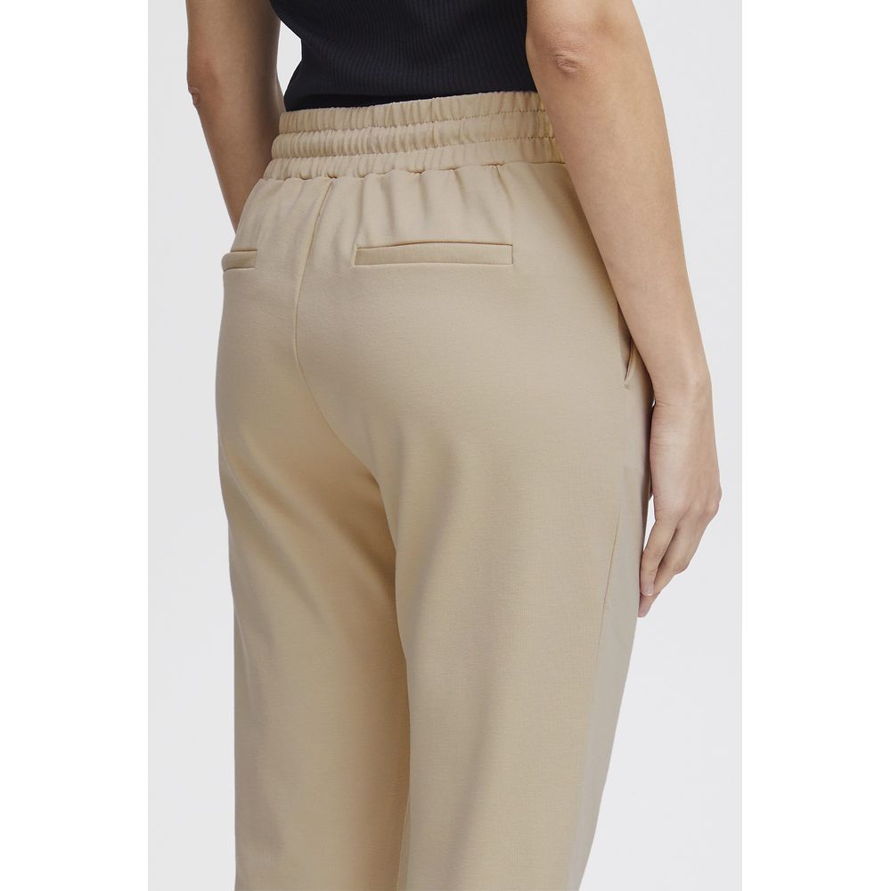 Back view of ICHI Beige Polyester Pants with elastic waistband and sleek design.