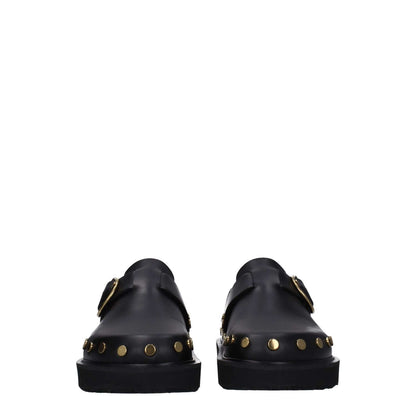 Isabel Marant Black Leather Slippers with gold studs, vintage style, buckle closure, and rubber sole, forward view.