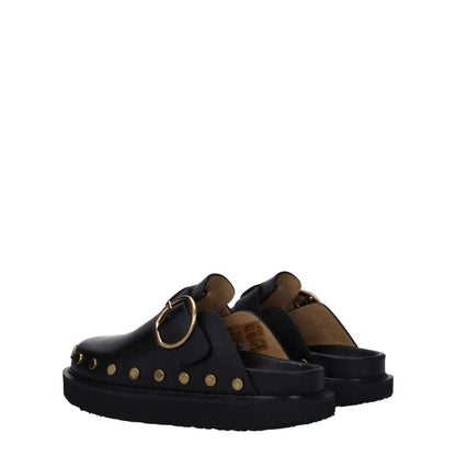 Isabel Marant Black Leather Slippers with gold studs, vintage effect, and buckle closure, featuring a round toe and rubber sole.
