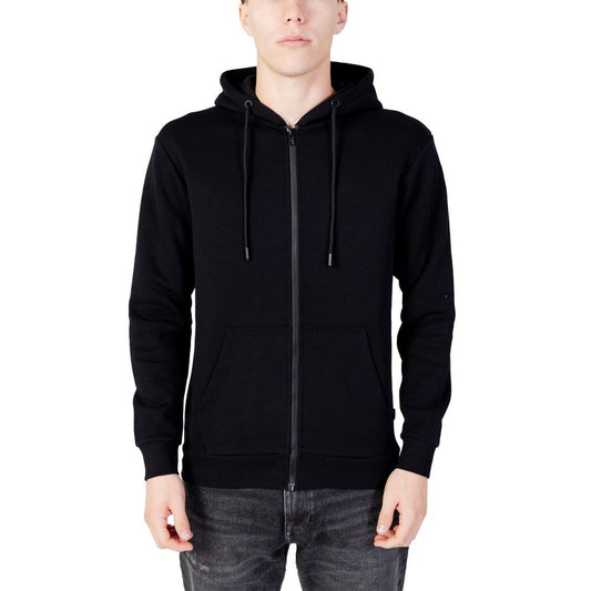 Man wearing Jack Jones Black Polyester Hoodie with full zip and adjustable drawstring hood for comfort and style.