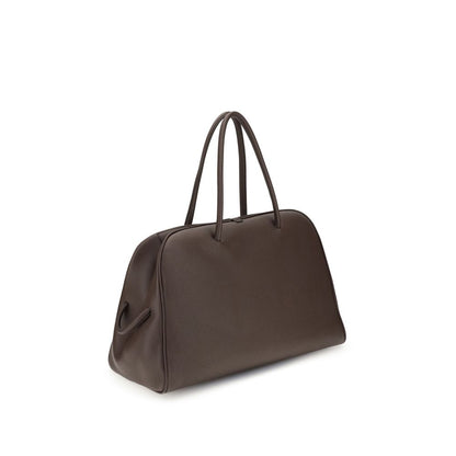 Jacquemus Brown Calf Leather Bos Taurus Handbag featuring elegant structured design with bow detail, perfect for travel.