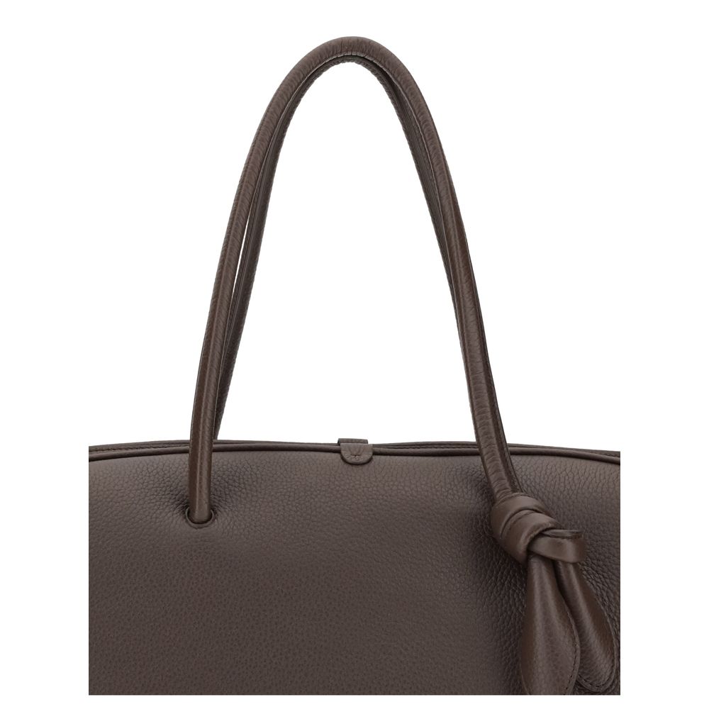 Jacquemus Brown Calf Leather Bos Taurus Handbag with bow detail and grained leather texture.