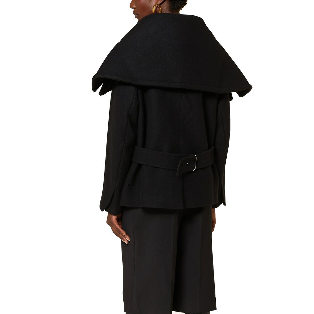 Front view with bag zipped and handles upright.
