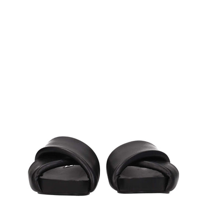 Jil Sander Black Leather Slippers with open toe and mid heels, featuring a vintage effect. Casual style, ideal for modern fashion lovers.