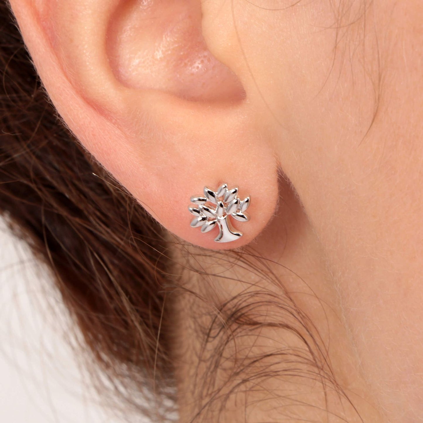 Woman wearing LA PETITE STORY JEWELRY Mod. LPS02ARQ09 silver tree earring