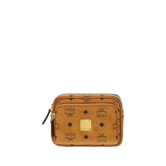 MCM Brown Cotton Shoulder Bag with iconic monogram print, gold-tone logo plaque, adjustable strap, and top zipper closure.