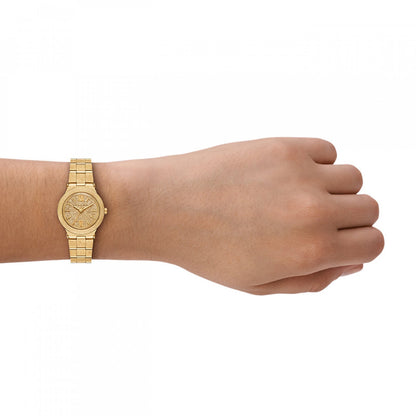 Gold wristwatch on a wrist showcasing the elegant design of the MICHAEL KORS Mod. BILLIE watch.