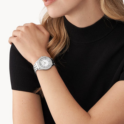 Woman wearing MICHAEL KORS Mod. HARLOWE wristwatch with stainless steel case and bracelet, showcased on wrist, 38mm 3 ATM water resistant