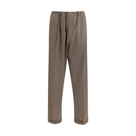 Magliano Brown Polyester Casual Pants with elastic waistband and side pockets, showcasing a relaxed fit for contemporary style.