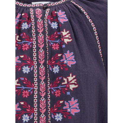 Detailed embroidery on Marant Etoile Blue Cotton Blouse with button closure and raglan sleeves.