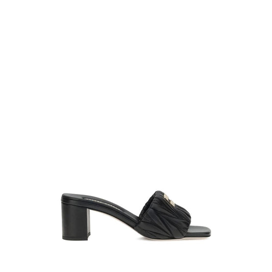 Miu Miu Black Lamb Ovis Aries Aries Stiletto Heel Sandals with squared toe and padded straps featuring Miu Miu monogram plaque.