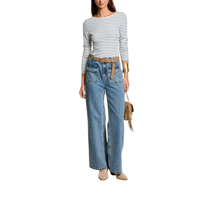 Model wearing Morgan De Toi White Viscose Long Sleeve T-Shirt with striped pattern and casual jeans outfit.