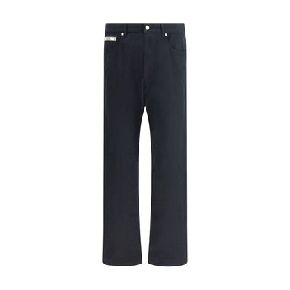Moschino Black Cotton Casual Pants with straight-leg cut, five-pocket style, zip closure, and signature patch, 100% cotton.