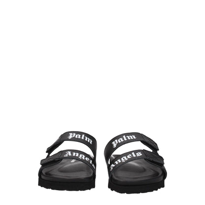 Palm Angels Black Leather Flat Sandals with front logo and strap closure, emphasizing casual style with rubber sole and low heel.