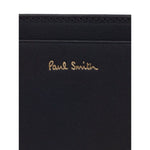 Paul Smith Signature Stripe leather card case with black card slots and logo stamp on the front.